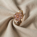 Rosa und goldene Glitzer-Ring