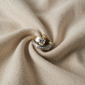Unregelmäßiger gold- und silberfarbener Ring