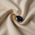 OHRRINGE MIT GOLD UND BLAUEN TOPASEN IM VINTAGE-STIL
