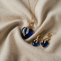 Kette und Ohrringe aus Gold