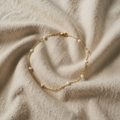 Ada – goldfarbene Gliederkette mit Perlenoptik-Intervallen