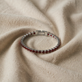 Tennisarmband aus Weißgold mit Rubin
